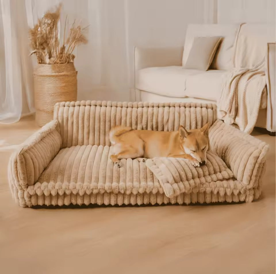 Orthopedic dog bed with elevated headrest